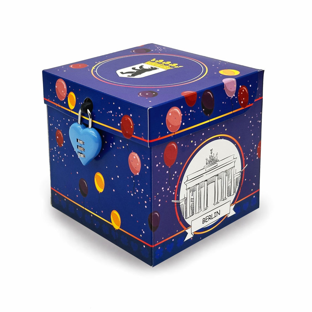 Rätselbox Geburtstag Berlin im Ballon-Design mit Brandenburger Tor, Berliner Bärenwappen und blauem Herz-Zahlenschloss.