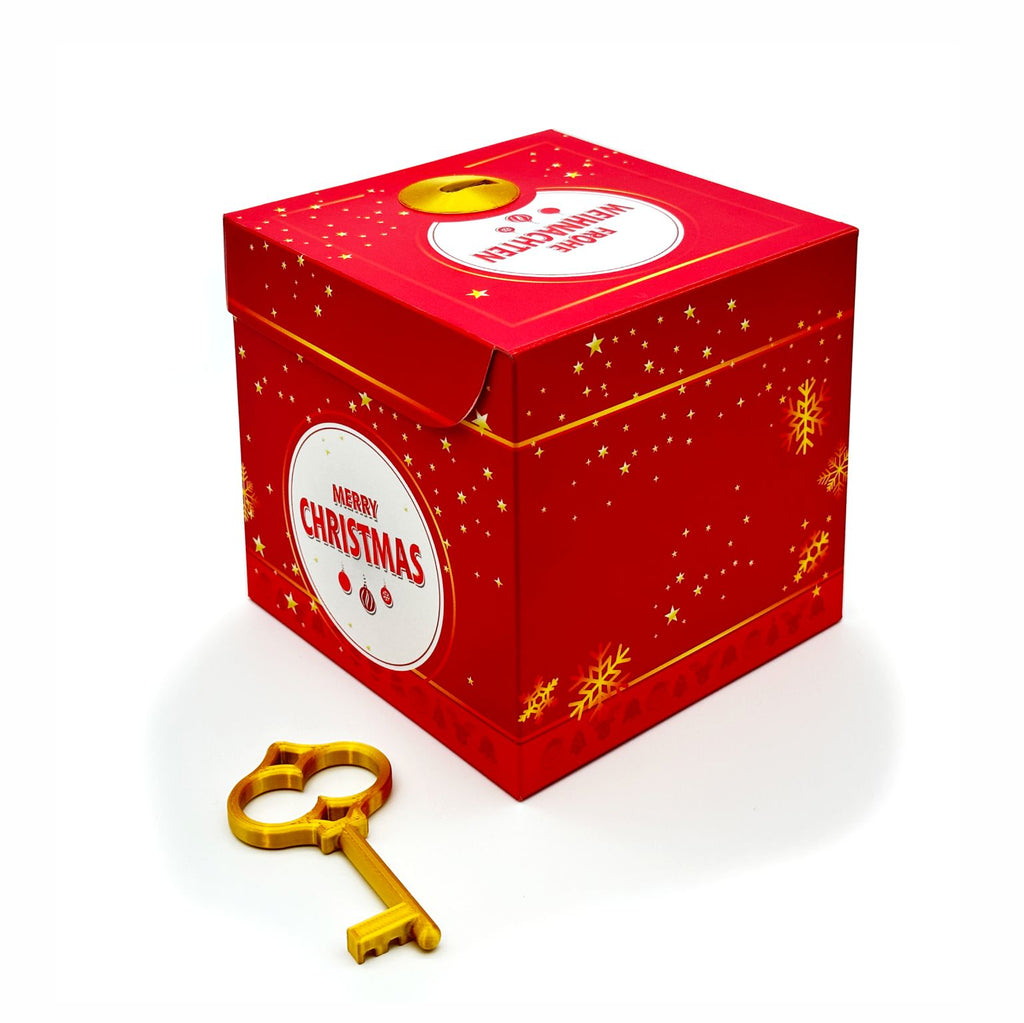Rote Schlossbox Weihnachten mit goldenem Schlüssel – Geschenkbox mit Schriftzug ‚Merry Christmas‘ und ‚Frohe Weihnachten‘ zum kreativen Verpacken von Gutscheinen oder Geldgeschenken mit Sternchen und Schneeflocken.