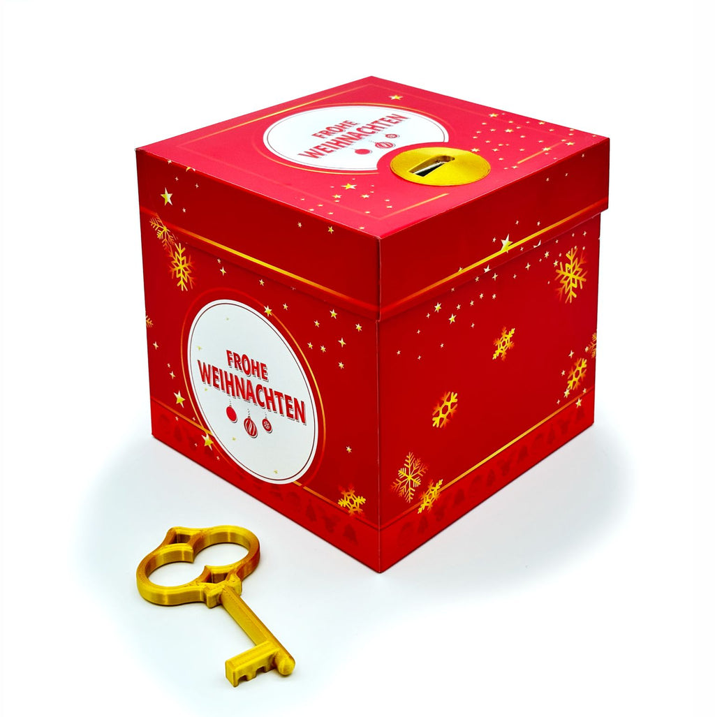 Rote Schlossbox Weihnachten mit goldenem Schlüssel – Geschenkbox mit Schriftzug ‚Frohe Weihnachten‘ zum kreativen Verpacken von Gutscheinen oder Geldgeschenken mit Sternchen und Schneeflocken.